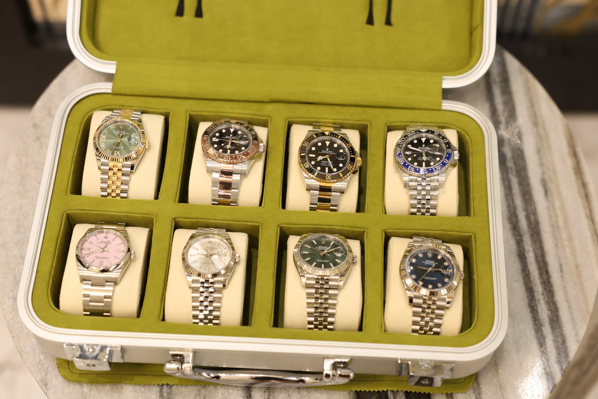 A travel case filled with Rolex watches
